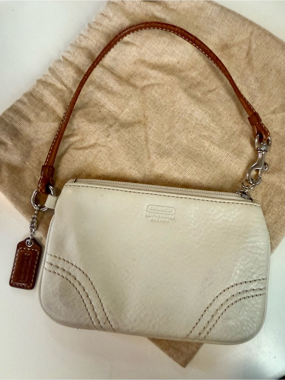 Coach Cream Pebble Leather Wristlet with Brown Strap